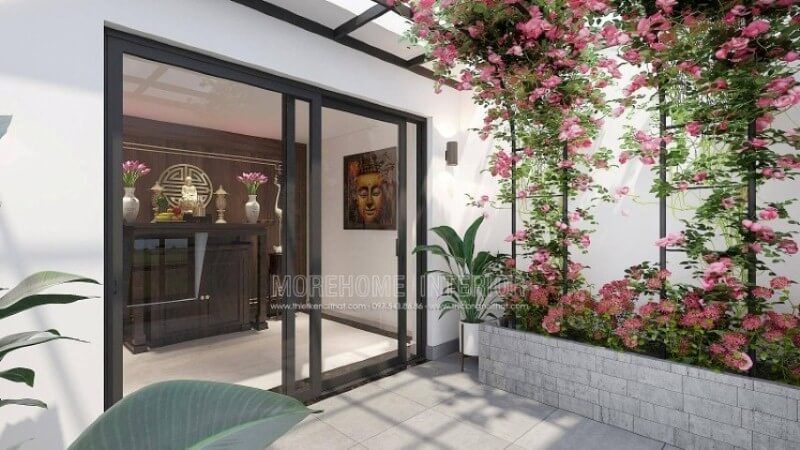 Morehome xin giới thiệu ý tưởng thiết kế phòng thờ thờ Phật Quan Âm trên đây với tủ thờ làm từ gỗ óc chó cao cấp kết hợp cùng tấm gỗ ốp tường với trọng tâm chữ Thọ tạo điểm tinh tế có phía trước hướng ra vườn hoa tuyệt đẹp sẽ là mẫu phòng thờ lý tưởng cho không gian nhà phố, biệt thự.